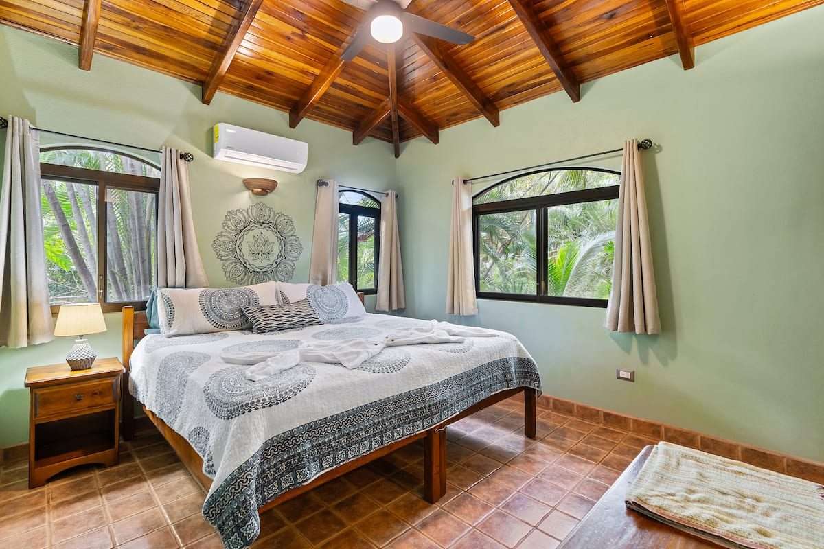 Bedroom of the Sirena Suite, a one-bedroom jungle villa